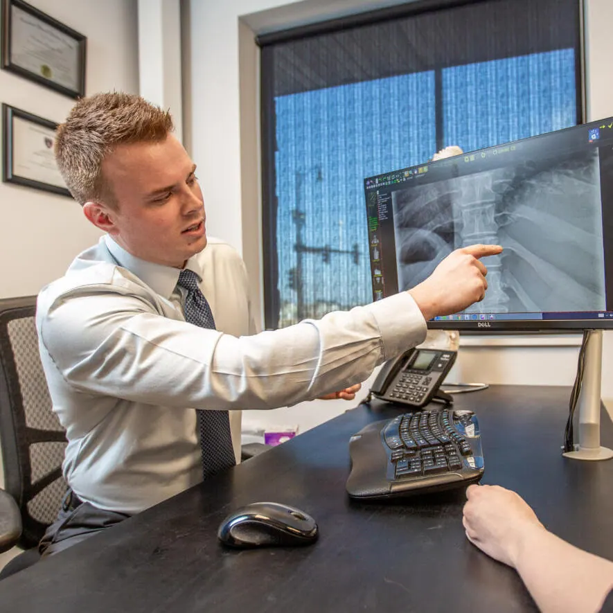 Dr. Andrew Jahner showing patient digital xray result